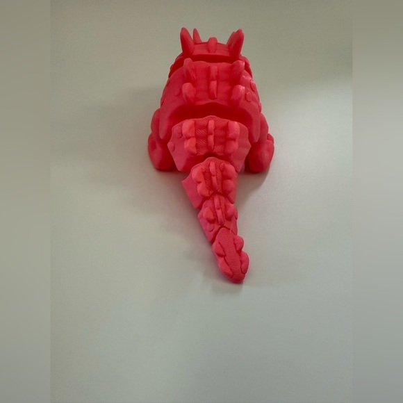 3D Printed Articulated Pink Dinosaur Toy – Flexible & Fun - Picture 13 of 14